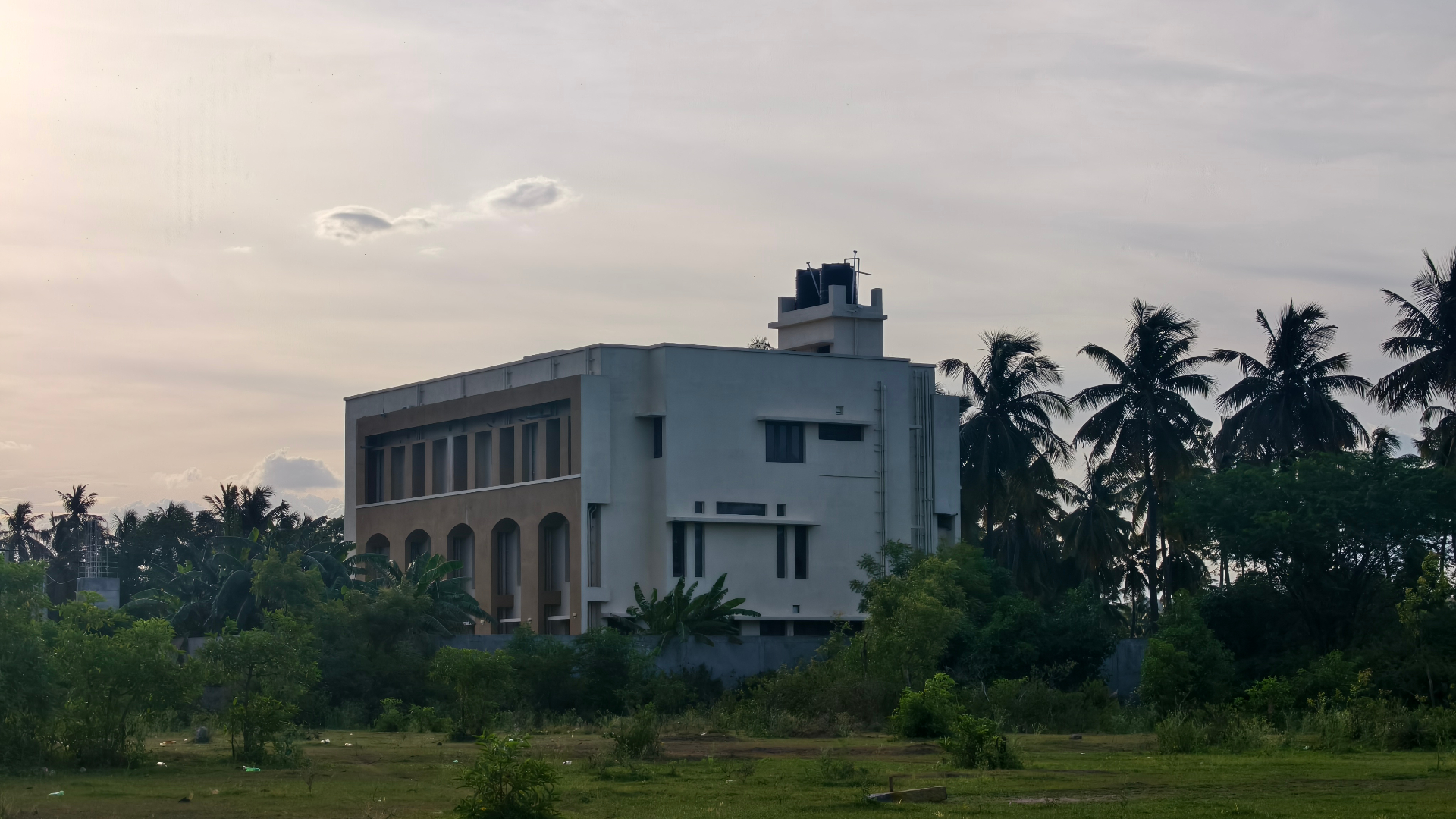 Krupa Sadanam Mar Thoma Guidance Home building at dusk, Chittoor