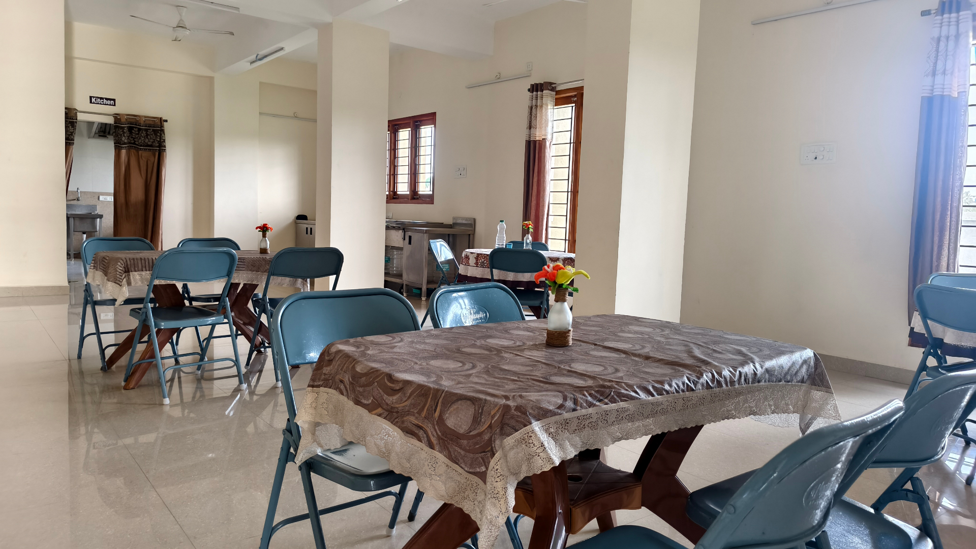 Dining hall and kitchen facilities at Krupa Sadanam